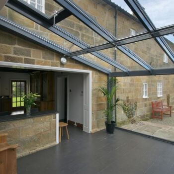 Clean skylights, roof windows and hard-to-reach glazing using purified water cleaning systems.