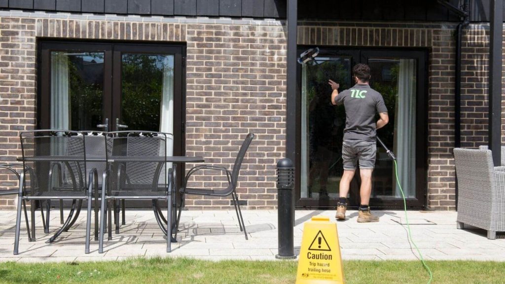 TLC Window cleaner providing professional cleaning services in Suffolk
