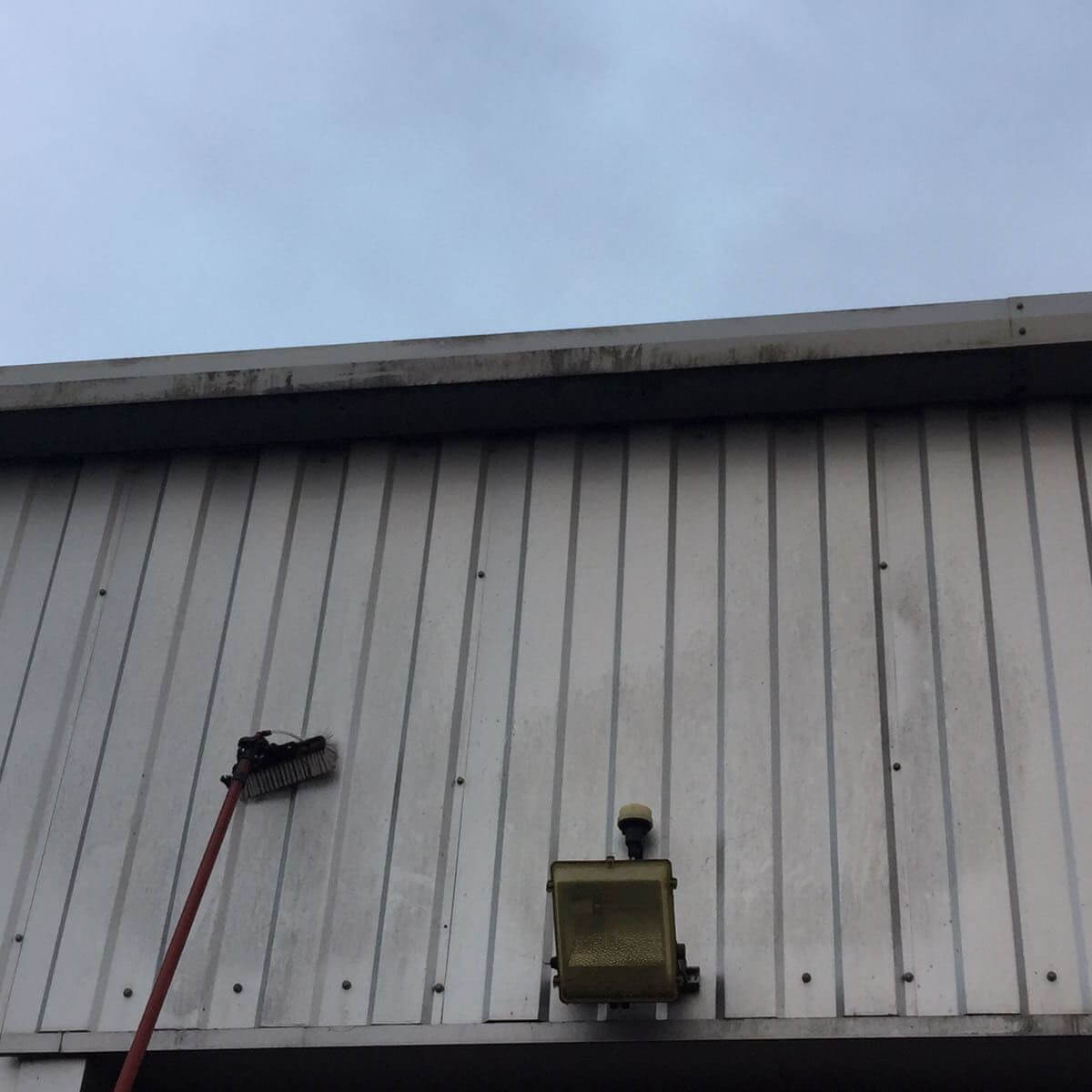 Commercial cladding cleaning on an industrial building by TLC Window Cleaning