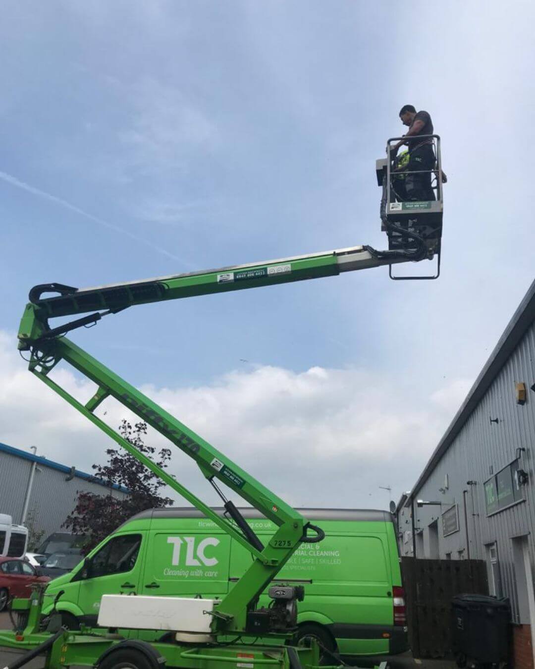 Commercial window cleaning using specialist access equipment and cherry pickers to safely clean high-level glazing and difficult-to-reach areas.