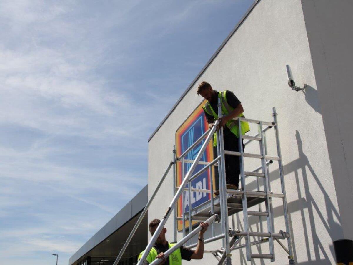 Commercial window cleaning using specialist access equipment to safely clean high-level glazing